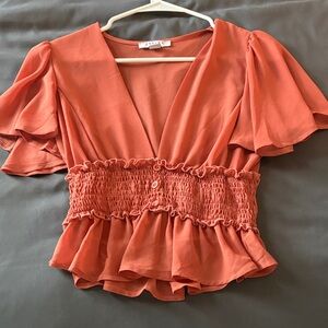 Elegant Coral Smocked Blouse